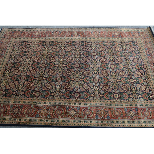 17 - Indo Persian rug with all-over Herati design, on a midnight blue ground with rust ground borders, 24... 
