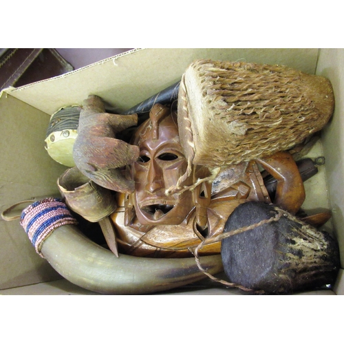 173 - Box containing a small quantity of Native African miniature drums, masks and a small brown case cont... 