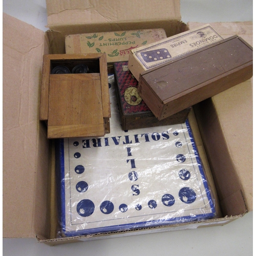 175 - Box containing a small quantity of various games, including dominoes, draughts, solitaire and chess