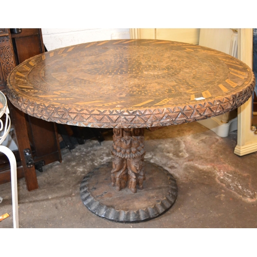 1784 - Unusual large African tribal hardwood circular centre table with marble inset top, 124cm diameter