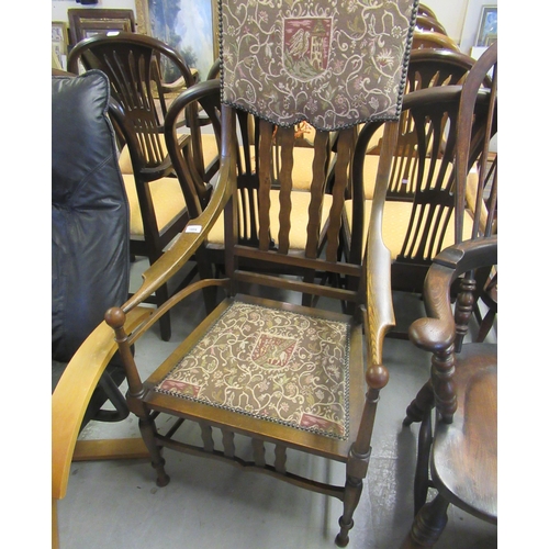 1804 - Art Nouveau oak open armchair with an upholstered and splat back above an upholstered seat, on turne... 