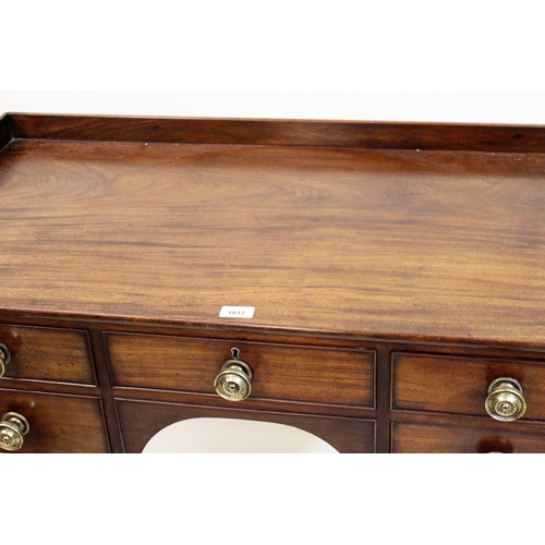 1817 - Regency mahogany five drawer side table having kneehole centre and brass knob handles, with ring tur... 