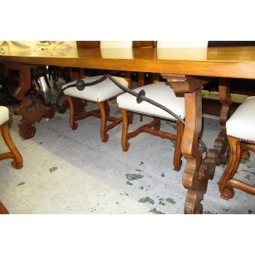 1818 - Mid 20th Century Casa Pupo walnut dining room suite, comprising a refectory style table with shaped ... 