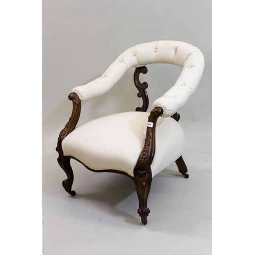 1842 - Victorian carved walnut tub shaped drawing room chair, the button upholstered horseshoe back with sc... 