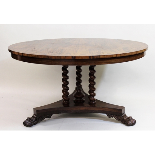 1844 - Victorian rosewood circular centre table, the tilt-top above a triple barley twist support and trian... 