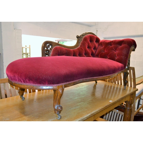 1848 - Victorian walnut chaise longue, the carved, pierced and button upholstered back and button upholster... 