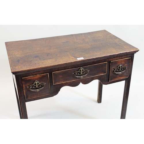 1855 - 18th Century oak lowboy with three drawers raised on chamfered supports