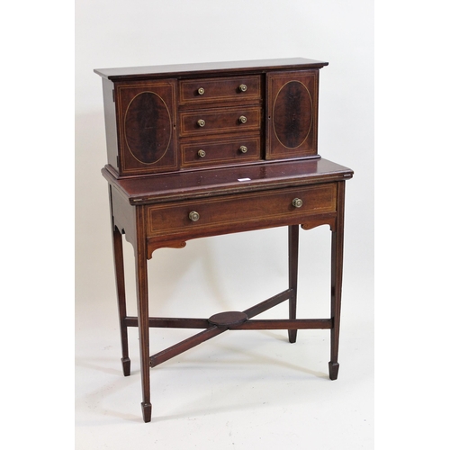 1866 - Ladies Edwardian mahogany boxwood line inlaid desk, the top with three drawers flanked by two doors,... 