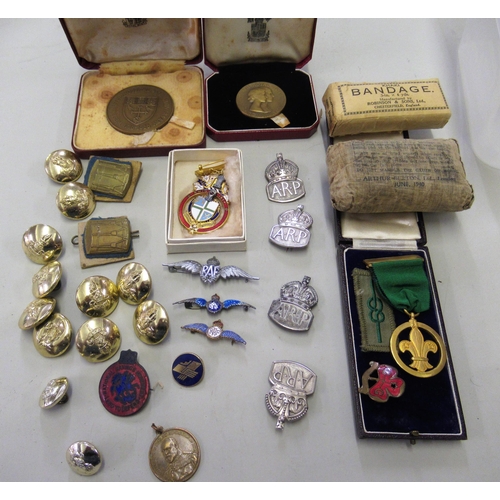 217 - 1938 Boy scout medal, a Masonic medal, quantity of silver A.R.P. badges, three RAF brooches and sund... 