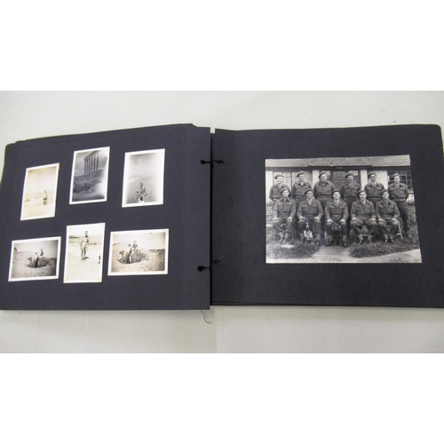 241 - Album containing a collection of World War II photographs, some including Churchill