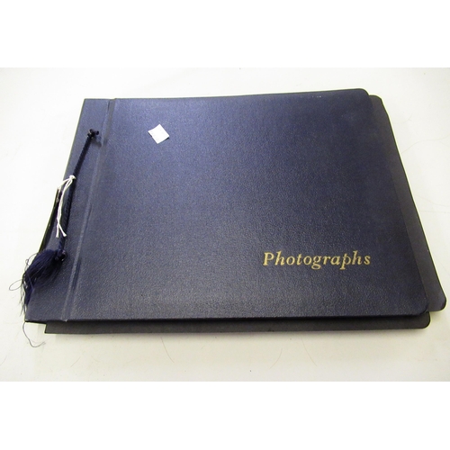 241 - Album containing a collection of World War II photographs, some including Churchill