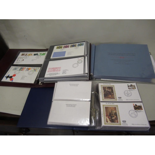 297 - Three albums containing a quantity of various British and Commonwealth First Day covers