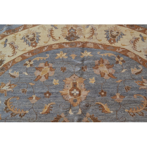 31 - Circular Afghan rug of Ziegler design in shades of grey, mustard and cream, 249cms diameter