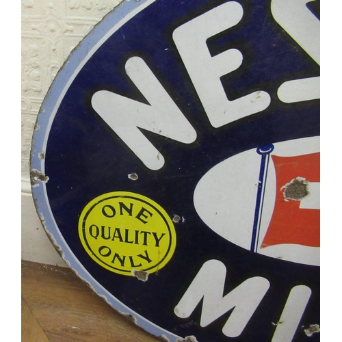 318 - Original early 20th Century Nestle's Milk oval sign, 2ft 32ins