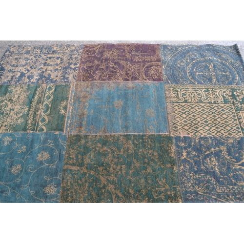 32 - Modern flatweave patchwork rug in shades of dark green and teal, 200cms x 140cms