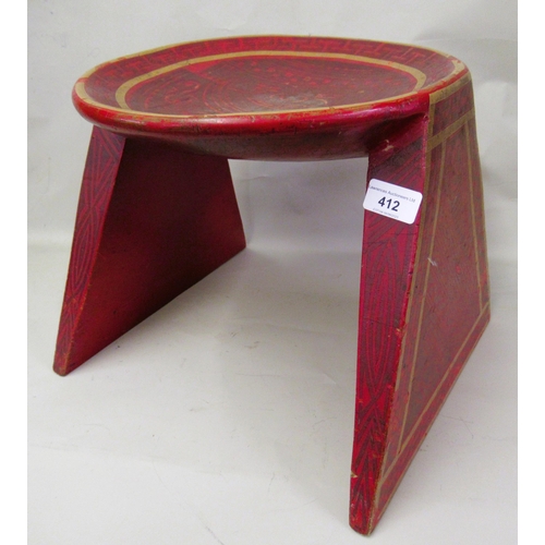 412 - Continental circular red lacquer decorated stool, 31cms diameter