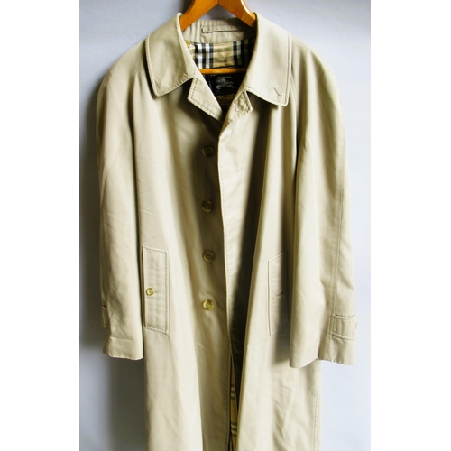 46 - Burberry, gentleman's raincoat with Nova check lining and concealed button fastening
