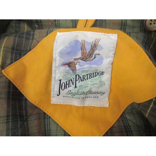 59 - Original Puffa jacket, size L and a John Partridge raincoat