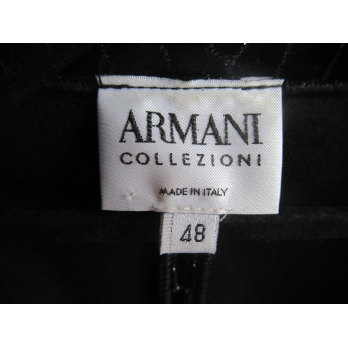 69 - Armani Collezioni, fitted black velour jacket with single button fastening, labelled size 48