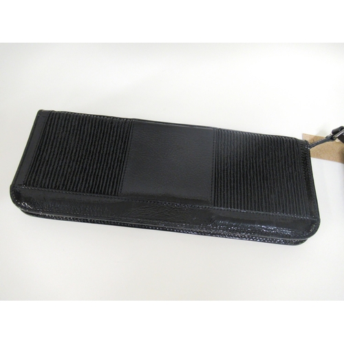 71 - Burberry, black patent leather clutch bag with elasticated wrist strap