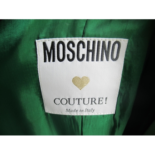 72 - Moschino Couture, ladies double breasted green blazer with bright pink edging.
Size 12 UK