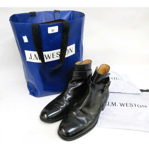 82 - J.M. Weston, pair of gentleman's black leather Jodhpur boots, complete with dust covers