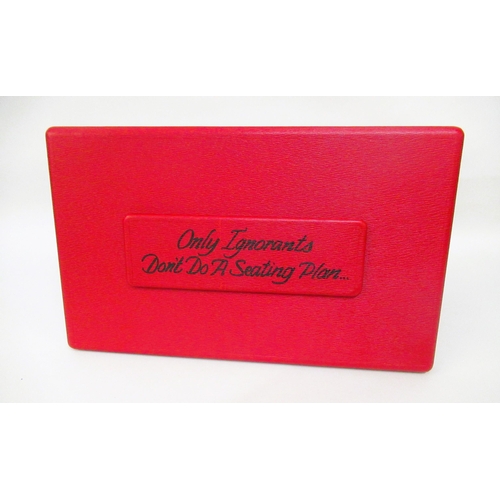 84 - Anya Hindmarch table planner, inscribed ' Only Ignorants Don't Do A Seating Plan....', 38cms x 23cms... 