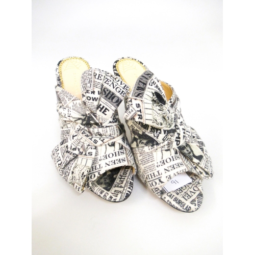 91 - Charlotte Olympia, pair of newspaper print Ilona mules, size 41