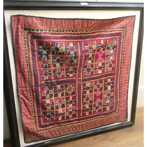 95 - Miniature silk double knot Hereke carpet, framed and another larger framed needlework panel