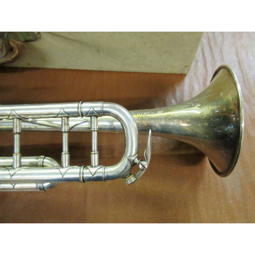 212 - French nickel plated brass trumpet by Aubertin, in original case