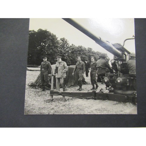 241 - Album containing a collection of World War II photographs, some including Churchill