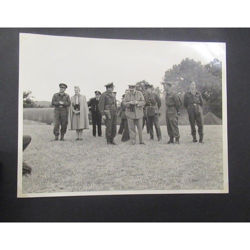 241 - Album containing a collection of World War II photographs, some including Churchill