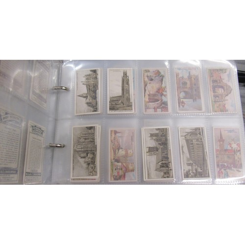 320 - Six albums containing a collection of Scarcer odds of cigarette cards from manufacturers C