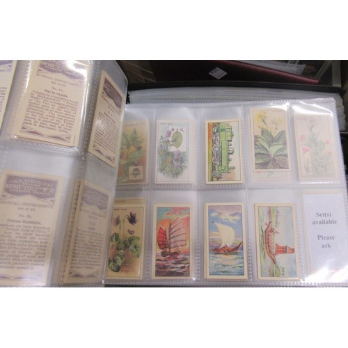 320 - Six albums containing a collection of Scarcer odds of cigarette cards from manufacturers C