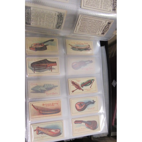 320 - Six albums containing a collection of Scarcer odds of cigarette cards from manufacturers C