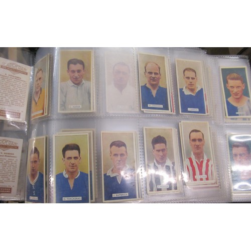 320 - Six albums containing a collection of Scarcer odds of cigarette cards from manufacturers C