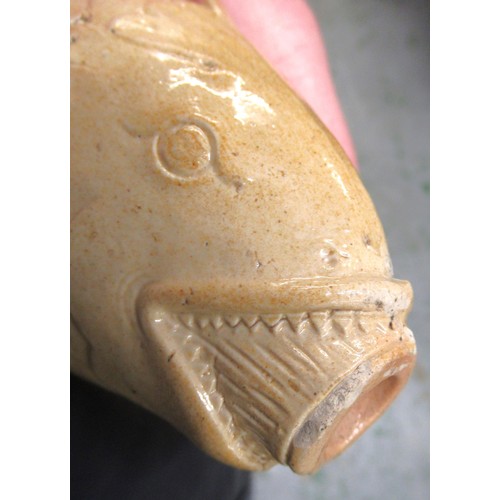 490 - 19th Century salt glazed stoneware bottle flask in the form of a fish, 18cms long