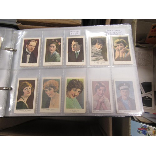 319 - Four albums containing a collection of odds of cigarette cards from manufacturers A&B (including Sca... 