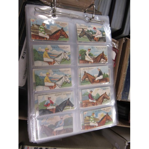 319 - Four albums containing a collection of odds of cigarette cards from manufacturers A&B (including Sca... 