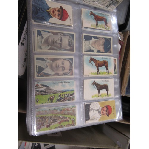 319 - Four albums containing a collection of odds of cigarette cards from manufacturers A&B (including Sca... 