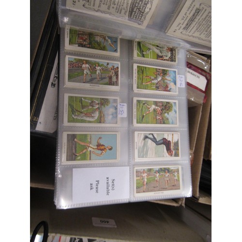 319 - Four albums containing a collection of odds of cigarette cards from manufacturers A&B (including Sca... 