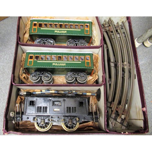 148 - ' Oxil ' electric 0 gauge train set in original box, together with an Atlas 0 gauge locomotive and t... 