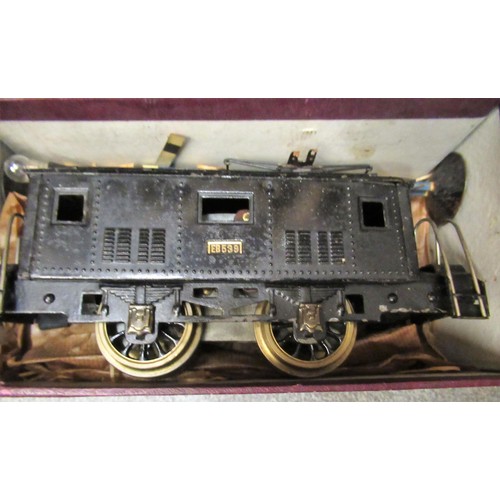 148 - ' Oxil ' electric 0 gauge train set in original box, together with an Atlas 0 gauge locomotive and t... 