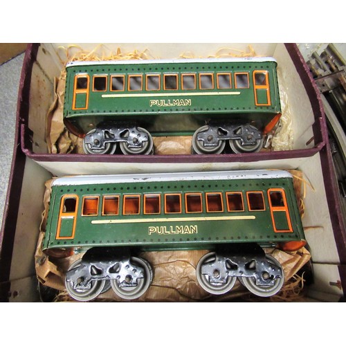 148 - ' Oxil ' electric 0 gauge train set in original box, together with an Atlas 0 gauge locomotive and t... 