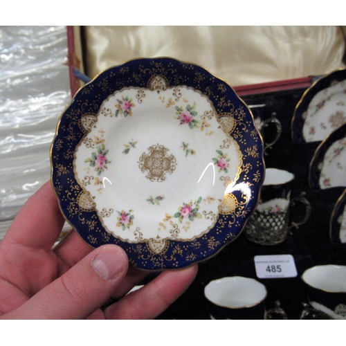 485 - Cased set of six Coalport porcelain coffee cans and saucers with silver holders