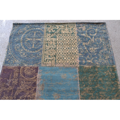 10 - Modern flatweave patchwork rug in shades of dark green and teal, 200cms x 140cms