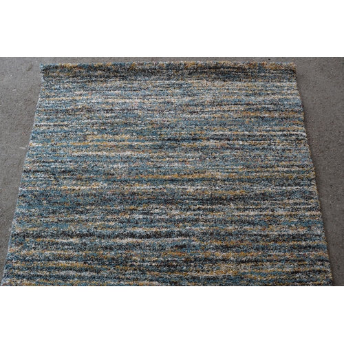 11 - Modern deep pile rug of abstract design, 194cms x 133cms