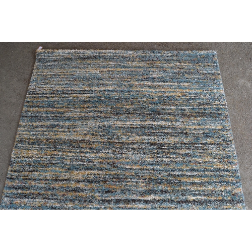 11 - Modern deep pile rug of abstract design, 194cms x 133cms