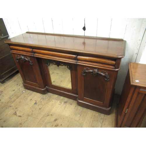 1871 - Victorian walnut sideboard with three frieze drawers above a central cupboard with mirror door, flan... 