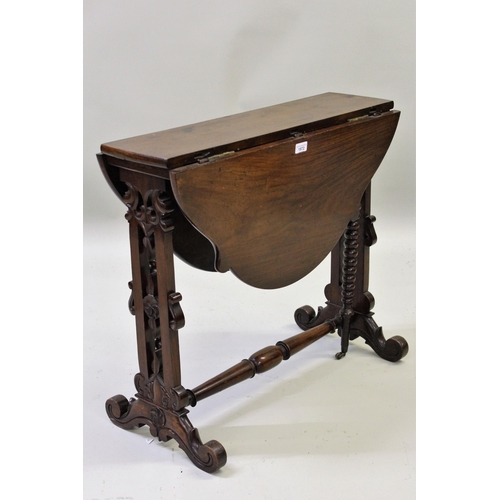 1872 - Victorian walnut Sutherland table with twin flap on pierced supports terminating in scroll feet, joi... 